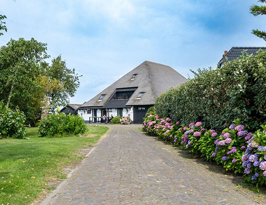 taxatie op texel nodig, woning met een pad ernaar toe